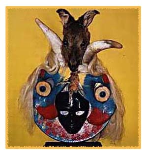 totems with masks and deerheadfor vividness